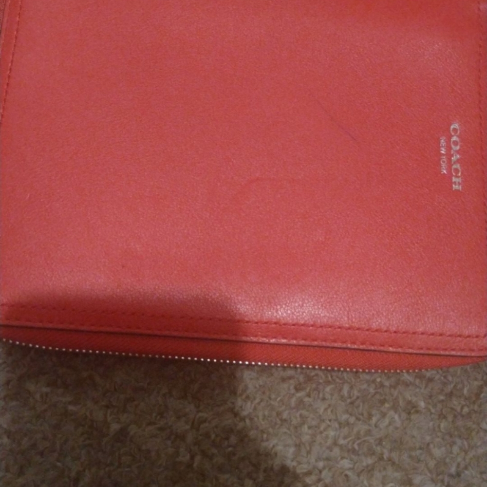 Coach address book with coach pen
